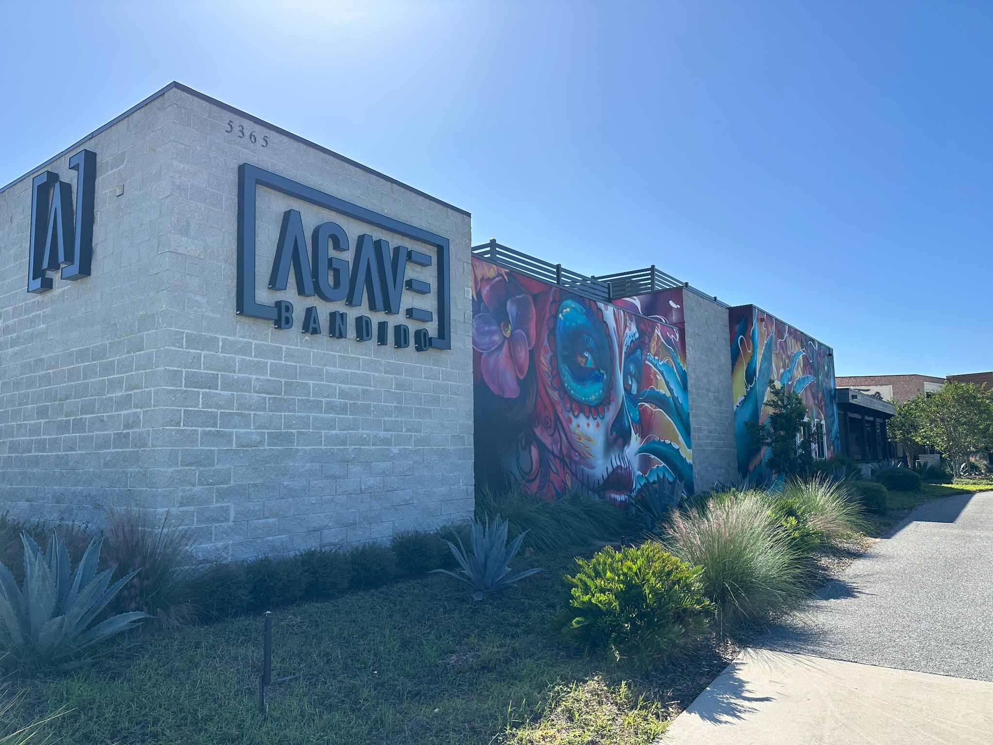 Agave Bandido restaurant exterior and colorful mural in Hamlin