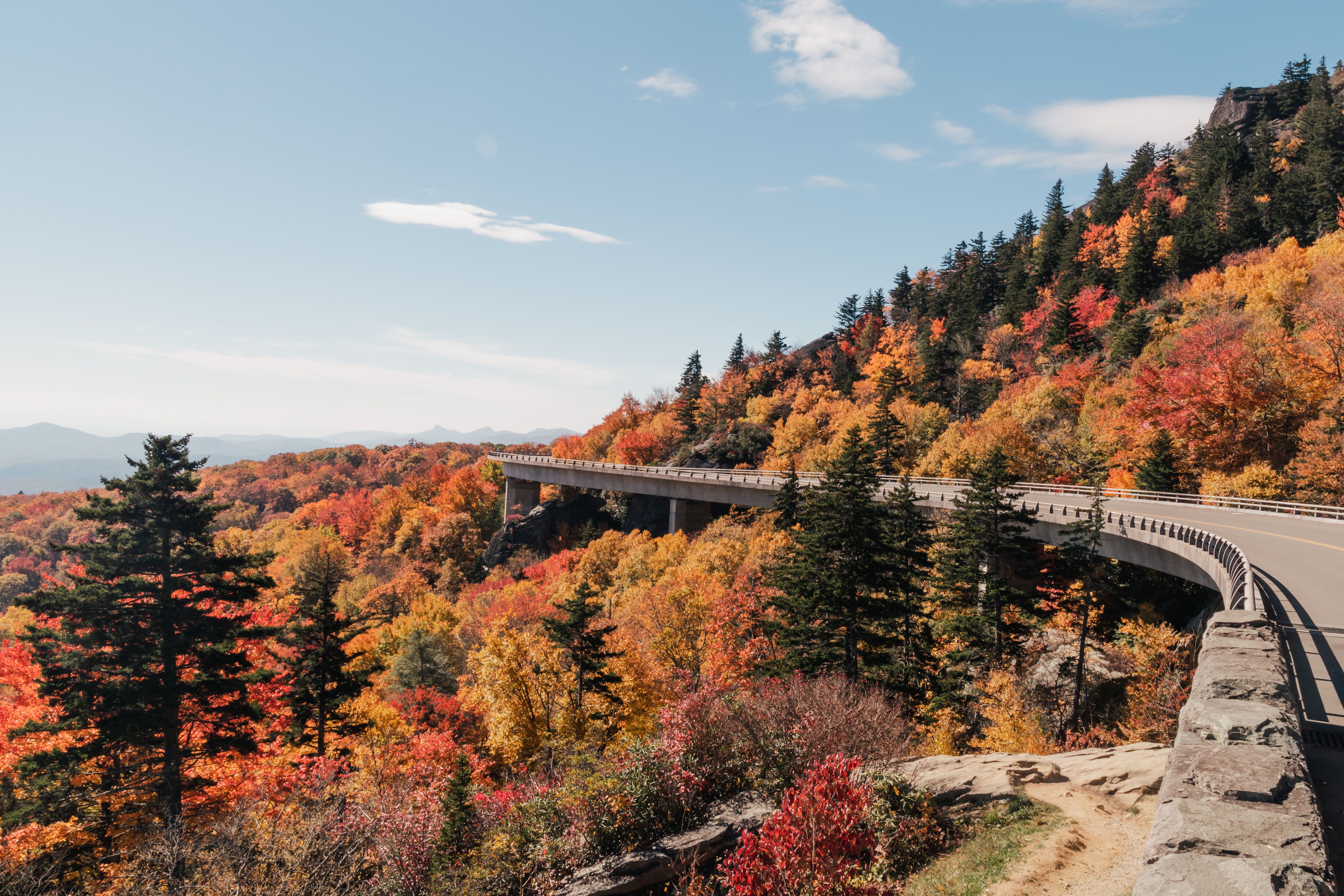 Breathtaking view of Blue Ridge Parkway surrounded by colorful fall foliage.