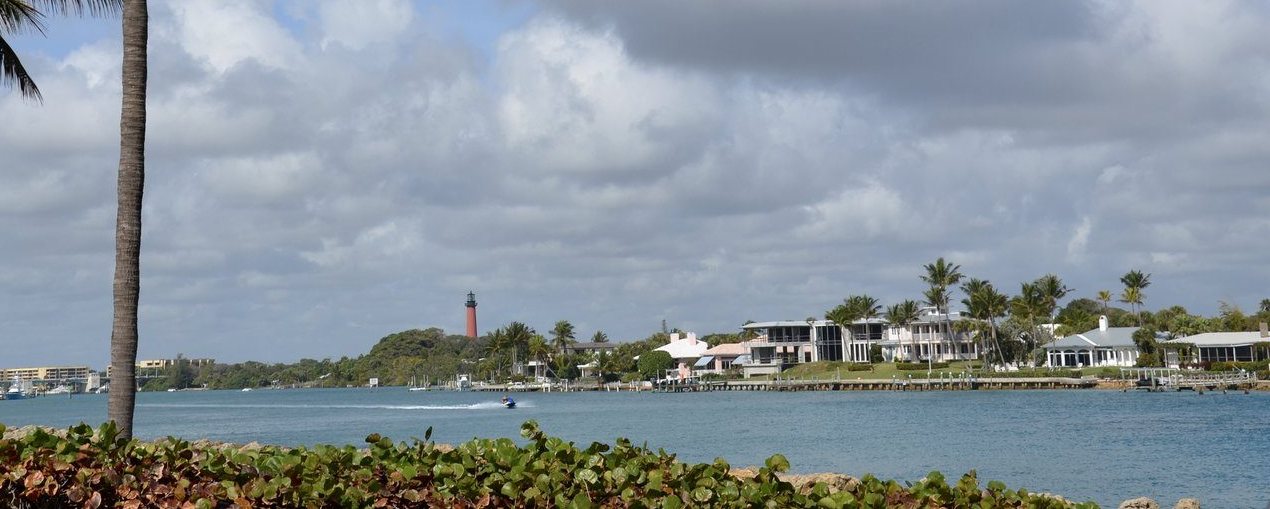 Jupiter Inlet shoreline with the lighthouse and waterfront homes