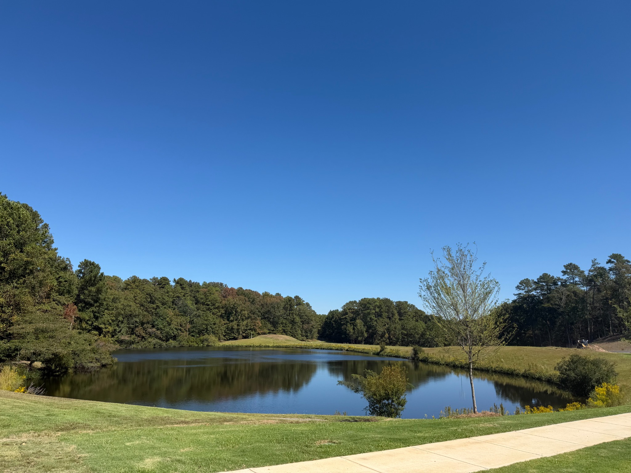 Lake and walking path at Riverwalk Village in Hoover Alabama