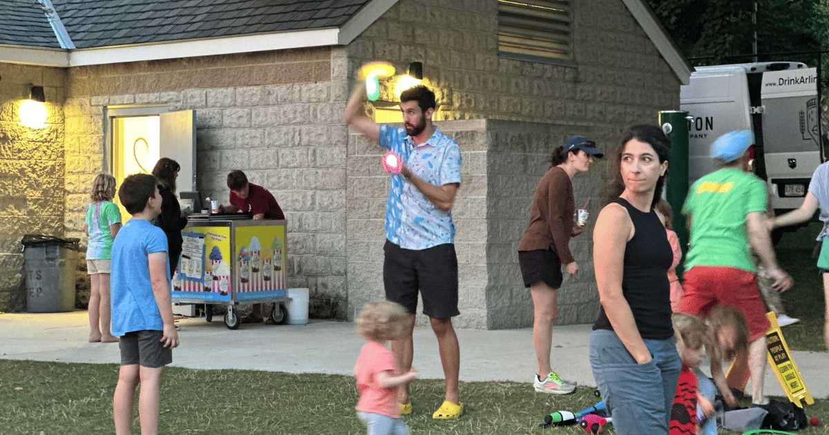 Man juggling for the audience. 