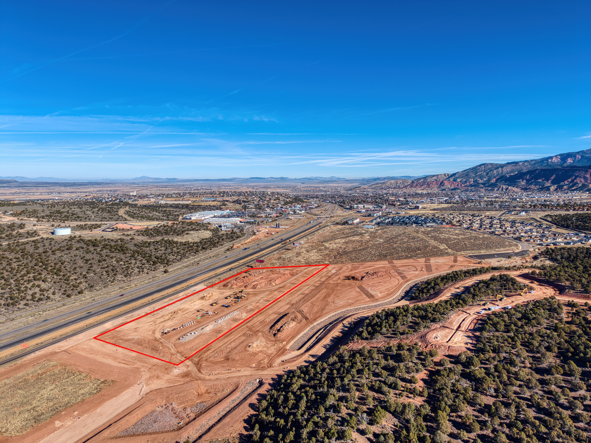 Ground-level view highlighting direct Interstate 15 access and commercial potential at Cedar Trails