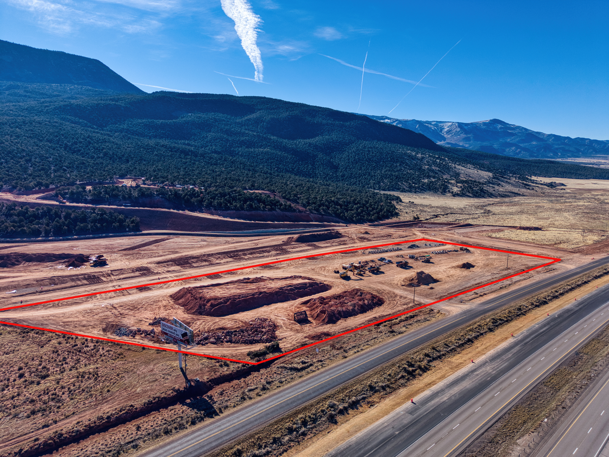 Site perspective of the 9.54-acre CC-zoned parcel with highway visibility and surrounding area