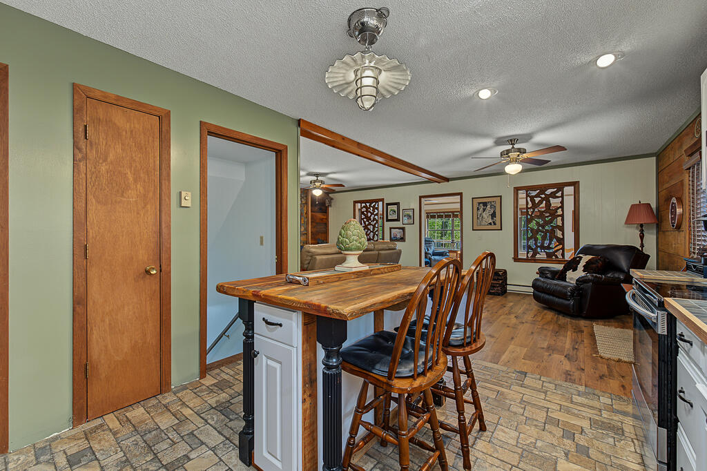 Kitchen and adjoining living space at 345 Trillium Trail