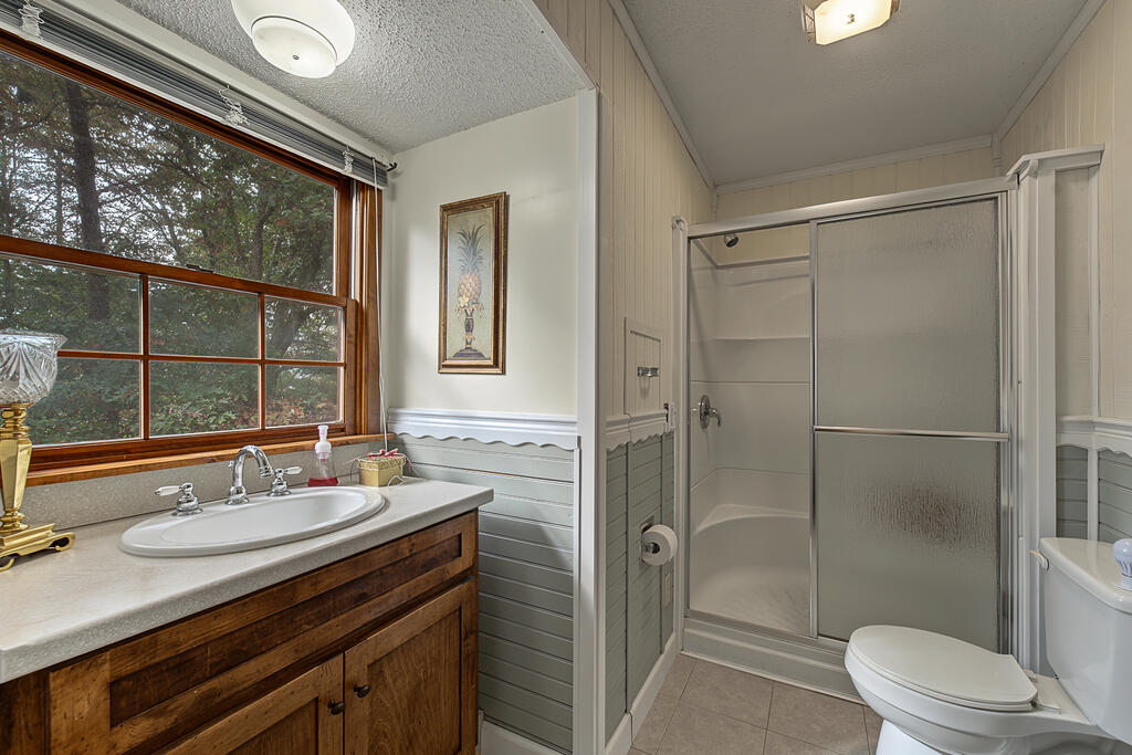 Bathroom with walk-in shower at 345 Trillium Trail