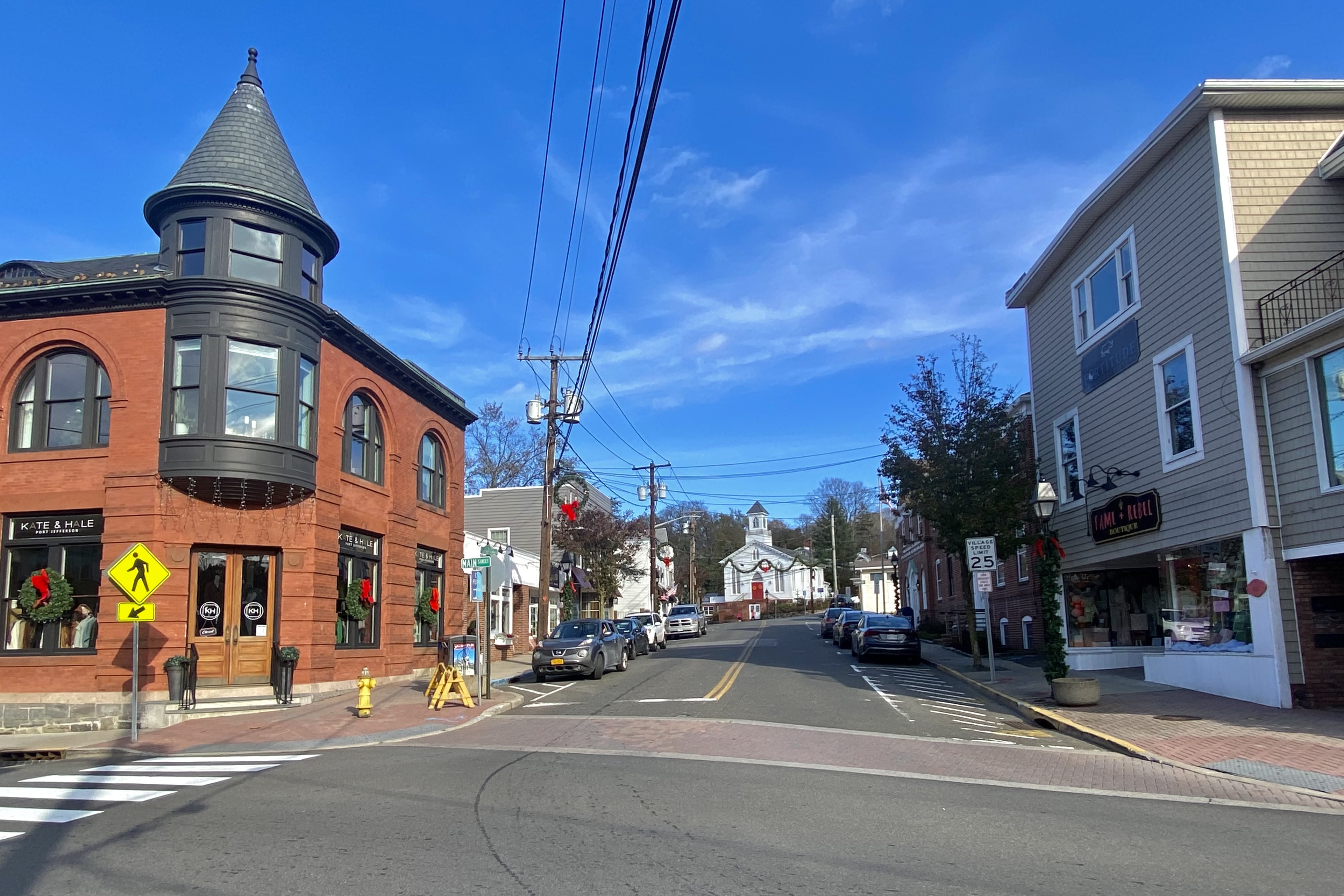 East Main Street in Port Jefferson decorated for the holiday season with festive red and green displays
