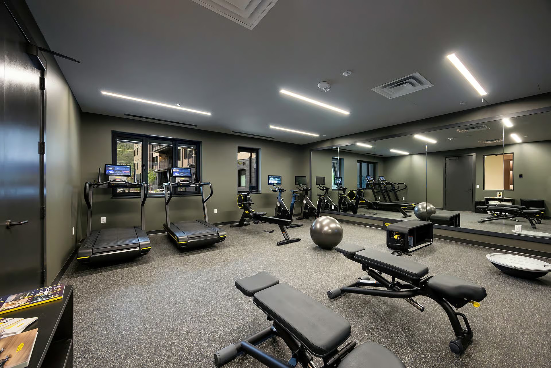 Amble fitness center with exercise equipment