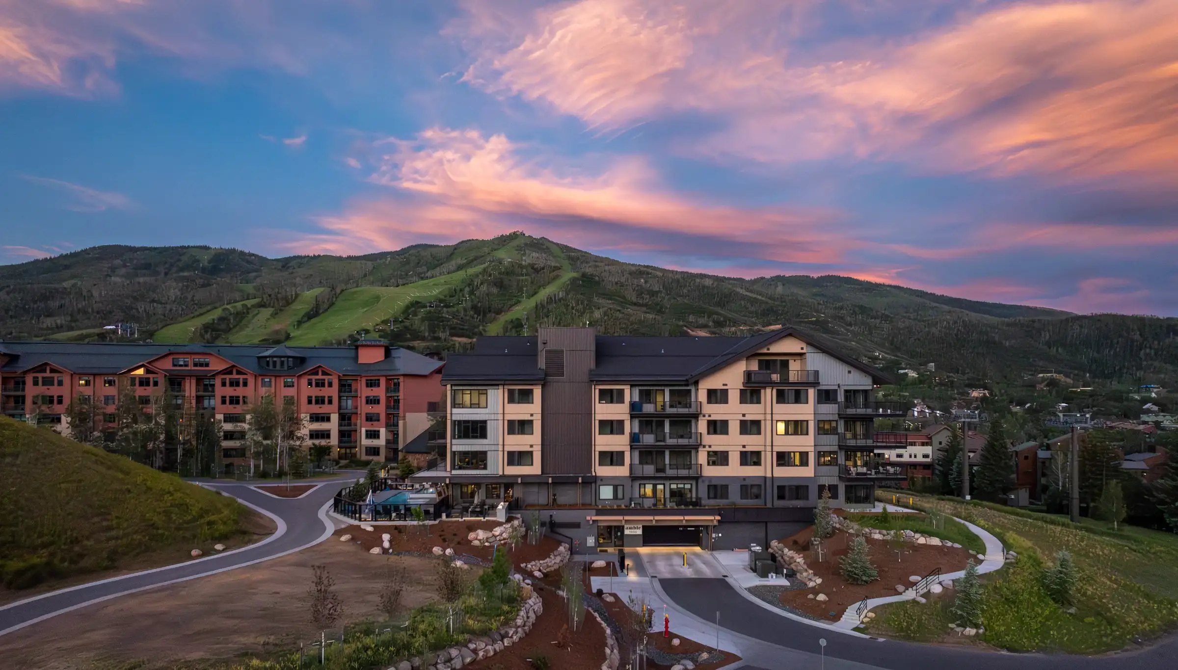 Completed Amble condominium building with Steamboat ski mountain behind it
