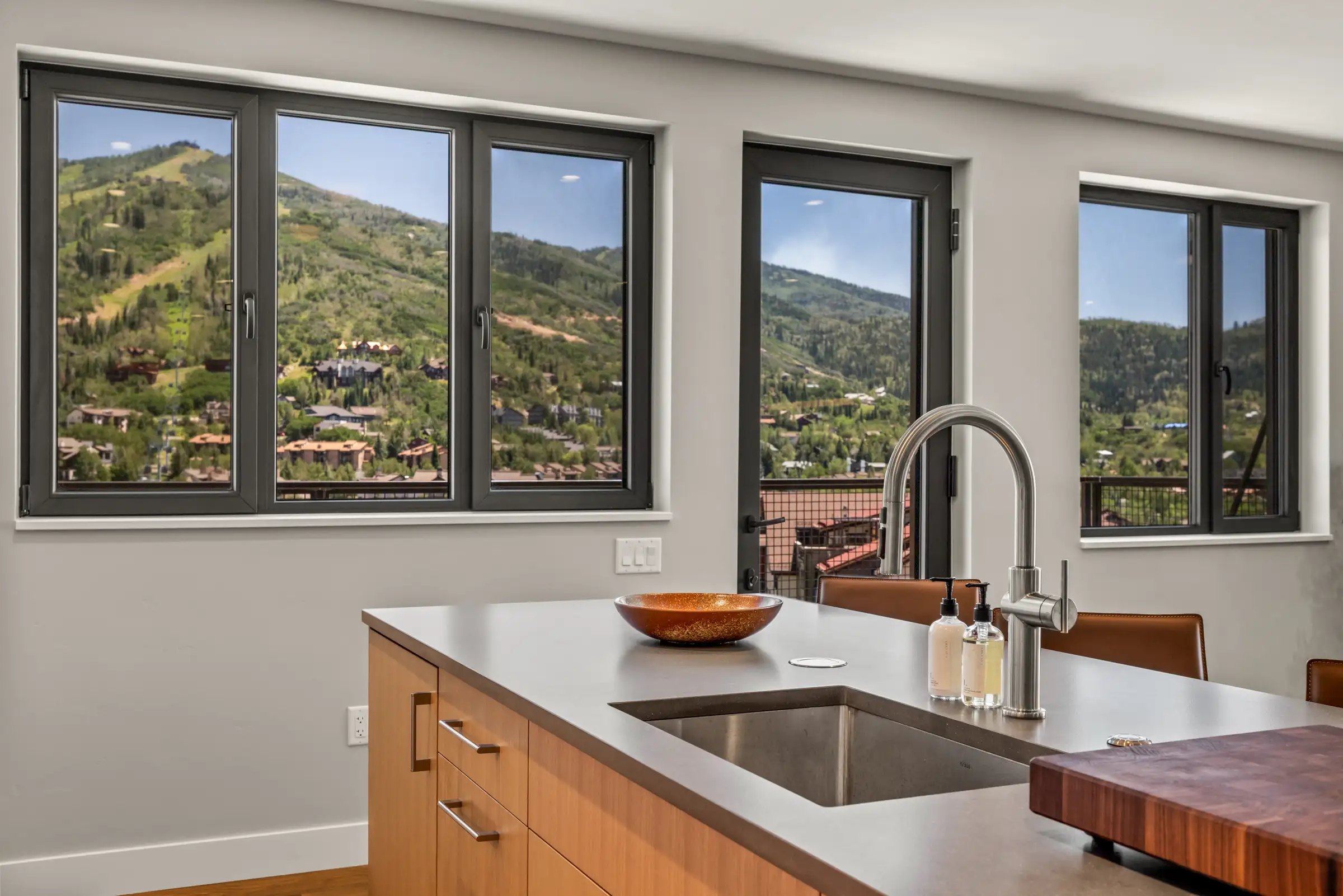 Kitchen and mountain views inside Amble Penthouse 411