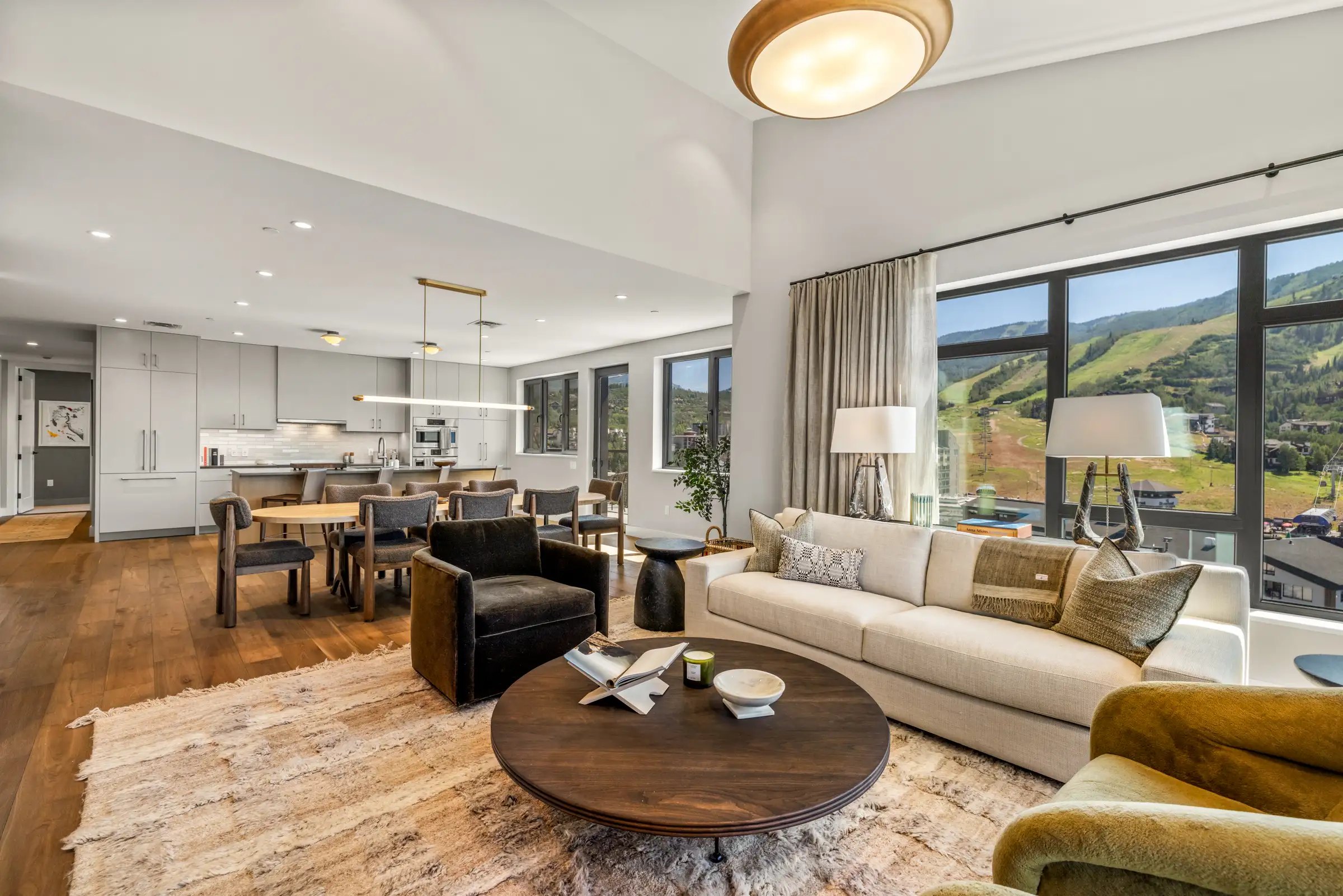 Completed Amble Penthouse 411 open-concept living room and kitchen