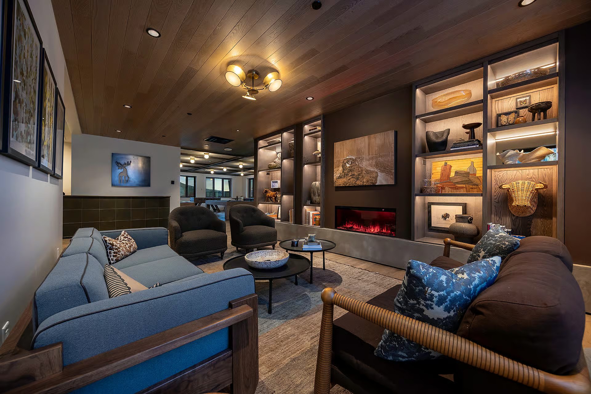 Amble resident lounge with fireplace and seating