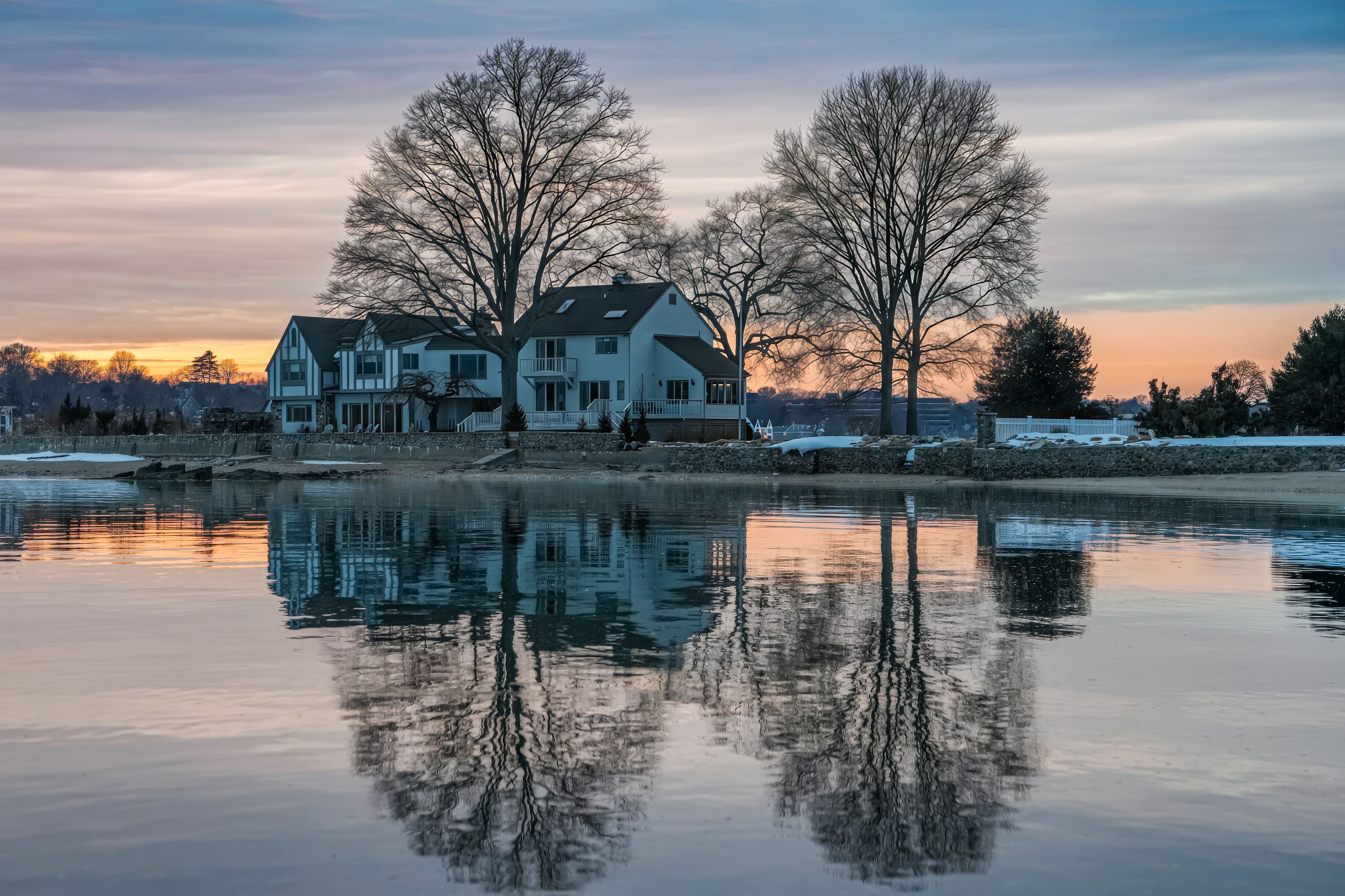serene lakeside houses at sunrise