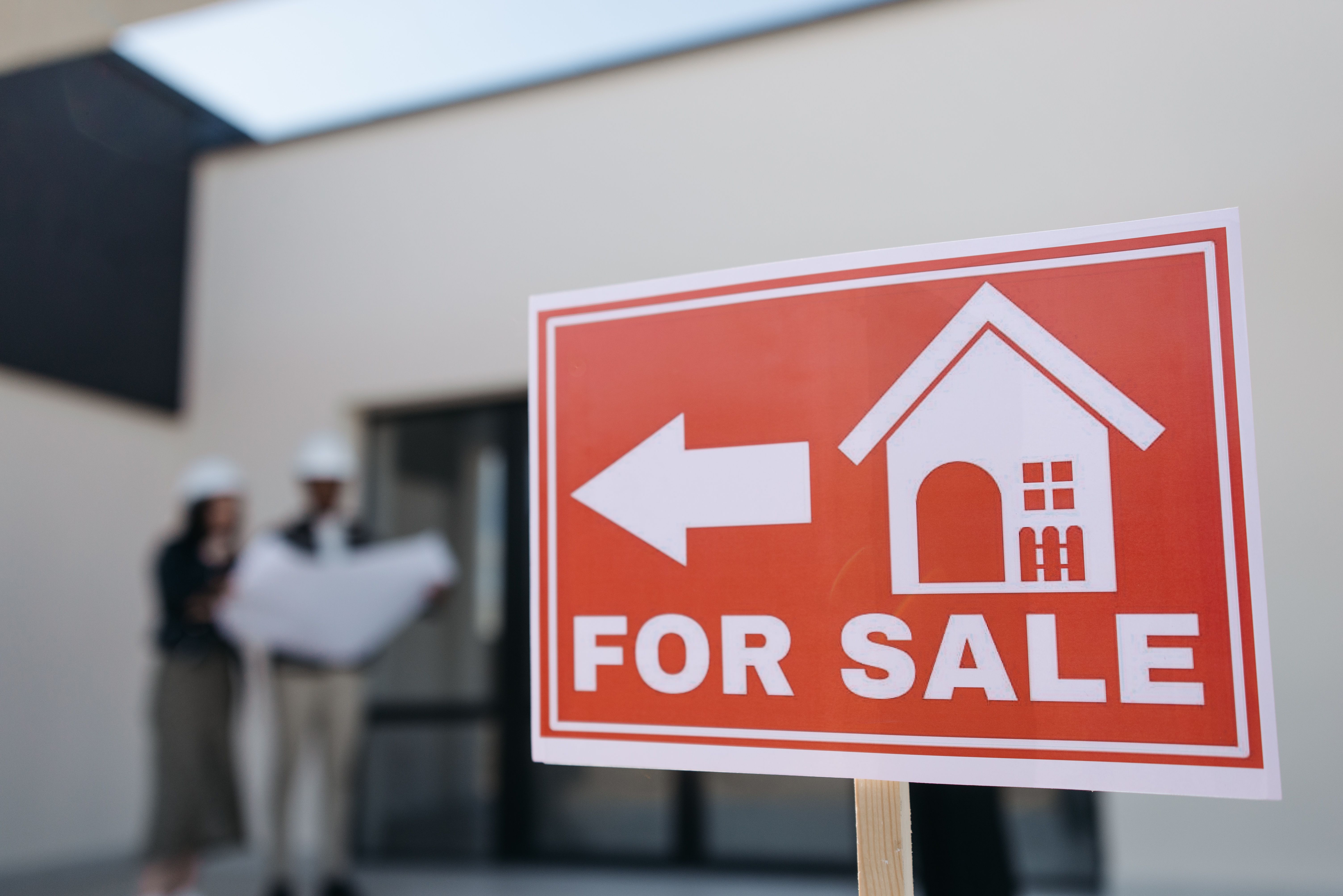 a house for sale red sign