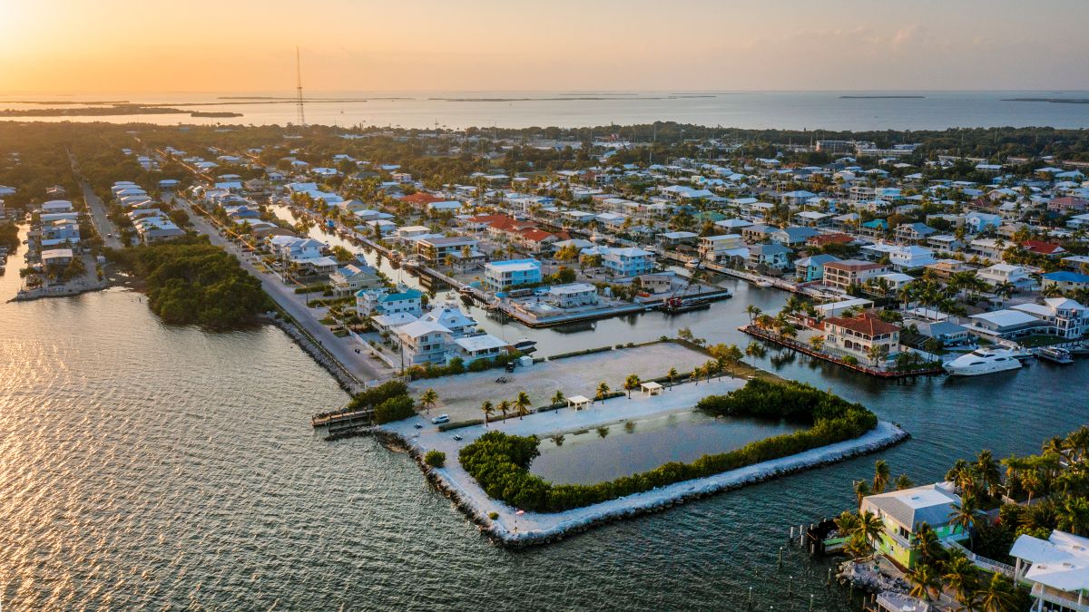 Port Largo canal neighborhood at sunset, oceanside Key Largo near Mile Marker 100