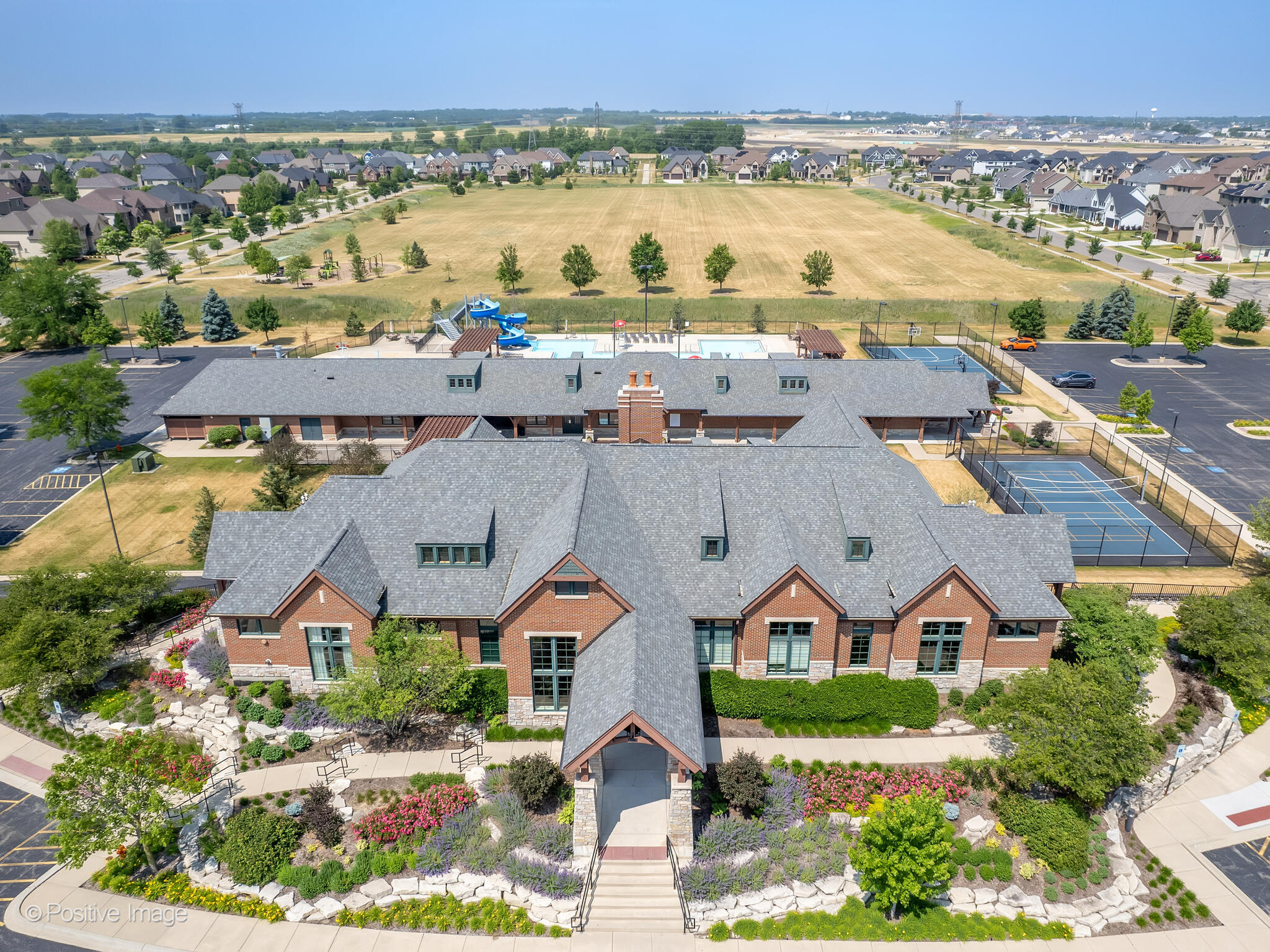 Front view of the Ashwood Park Club clubhouse building in the Ashwood Park neighborhood of Naperville