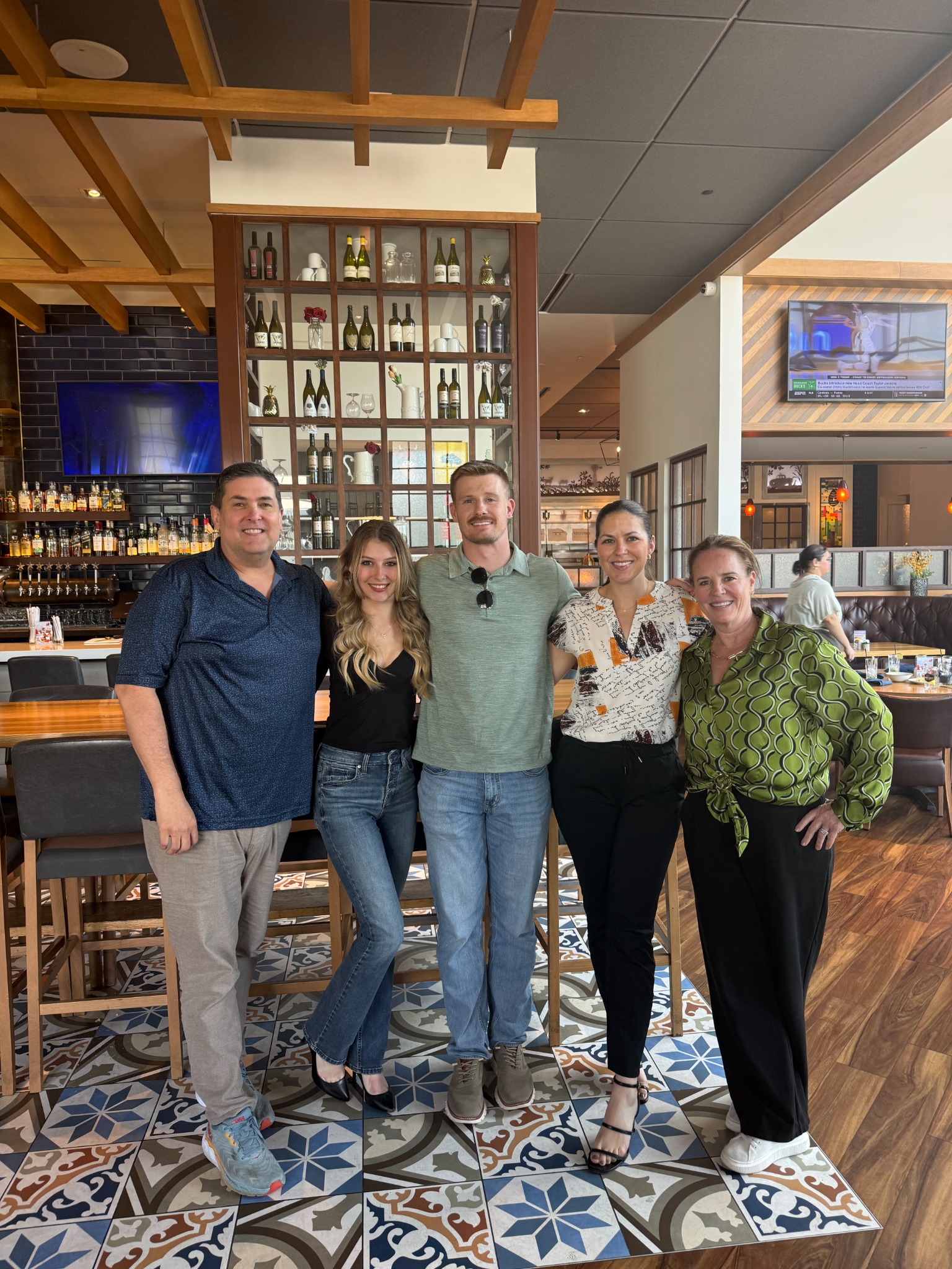 Kindred Real Estate Group team members together at a restaurant gathering