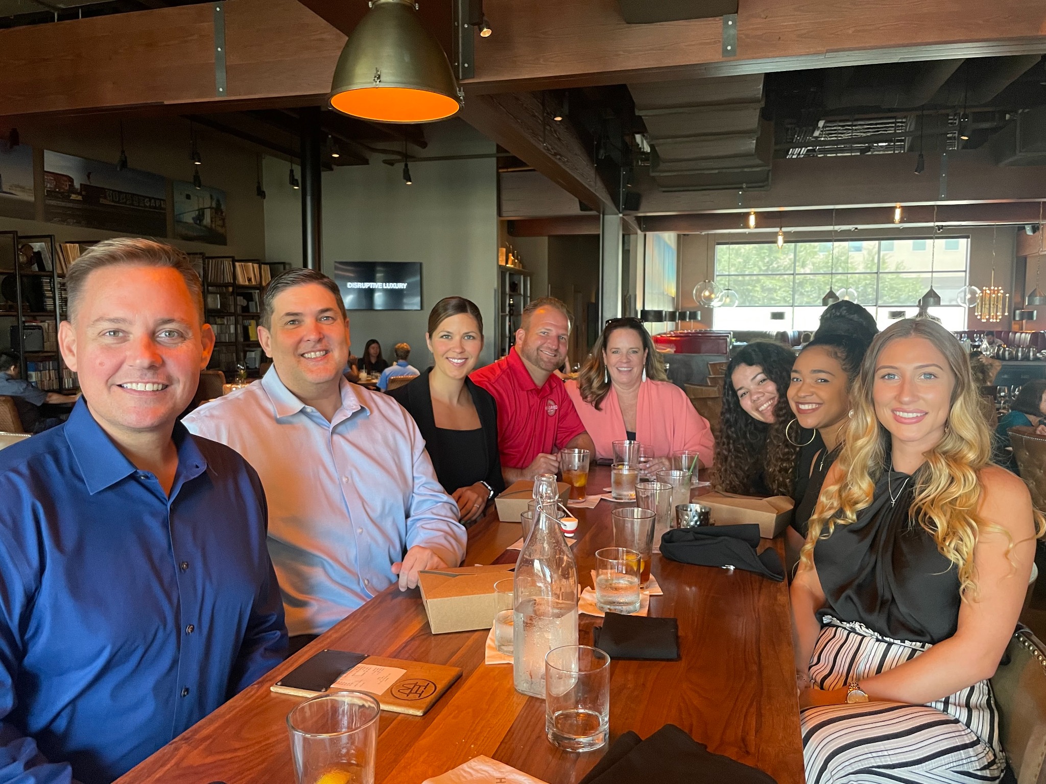 Kindred team members sharing a team lunch
