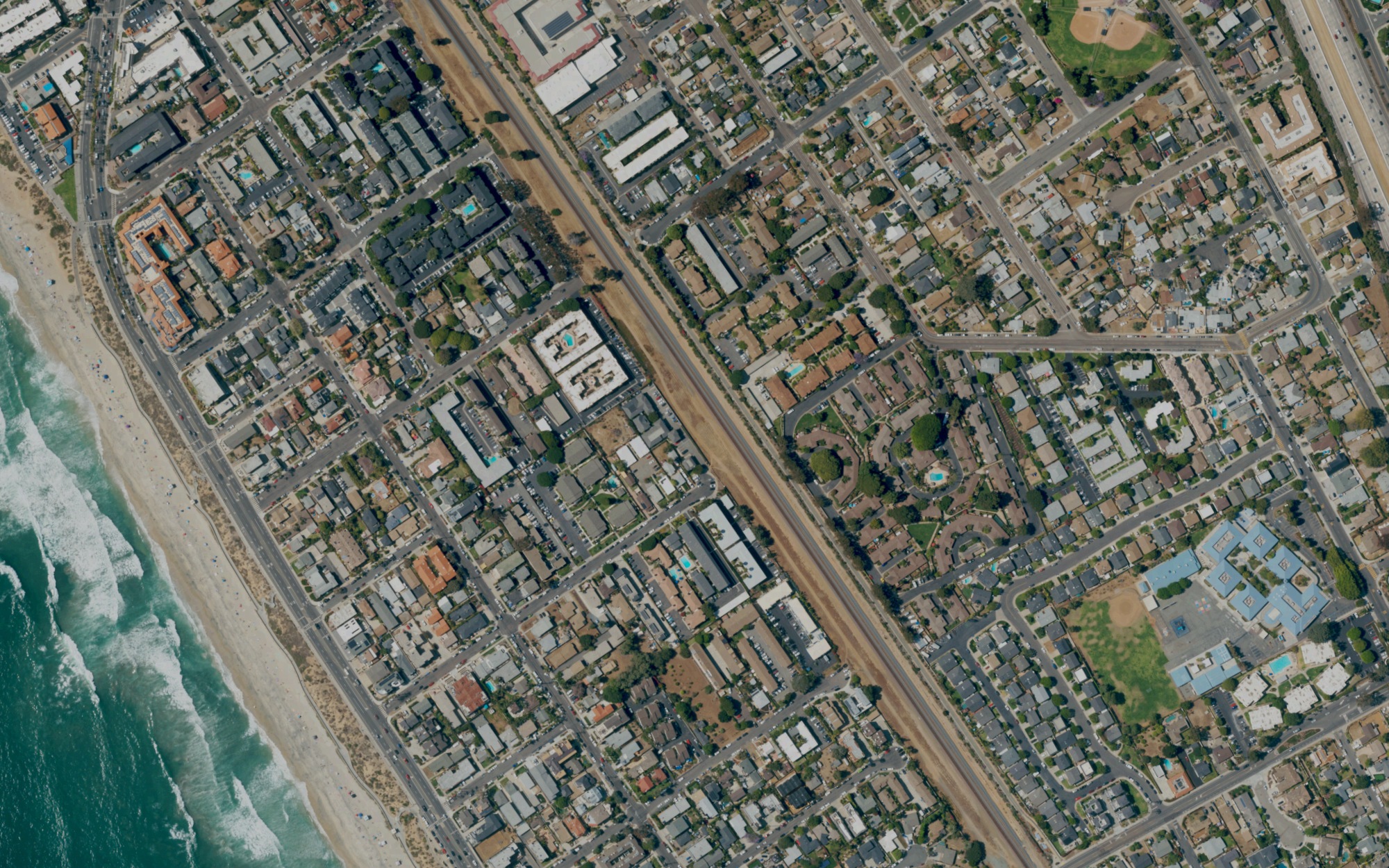Actual aerial photograph of the Carlsbad Village & Barrio area; historical 2022 imagery selection.