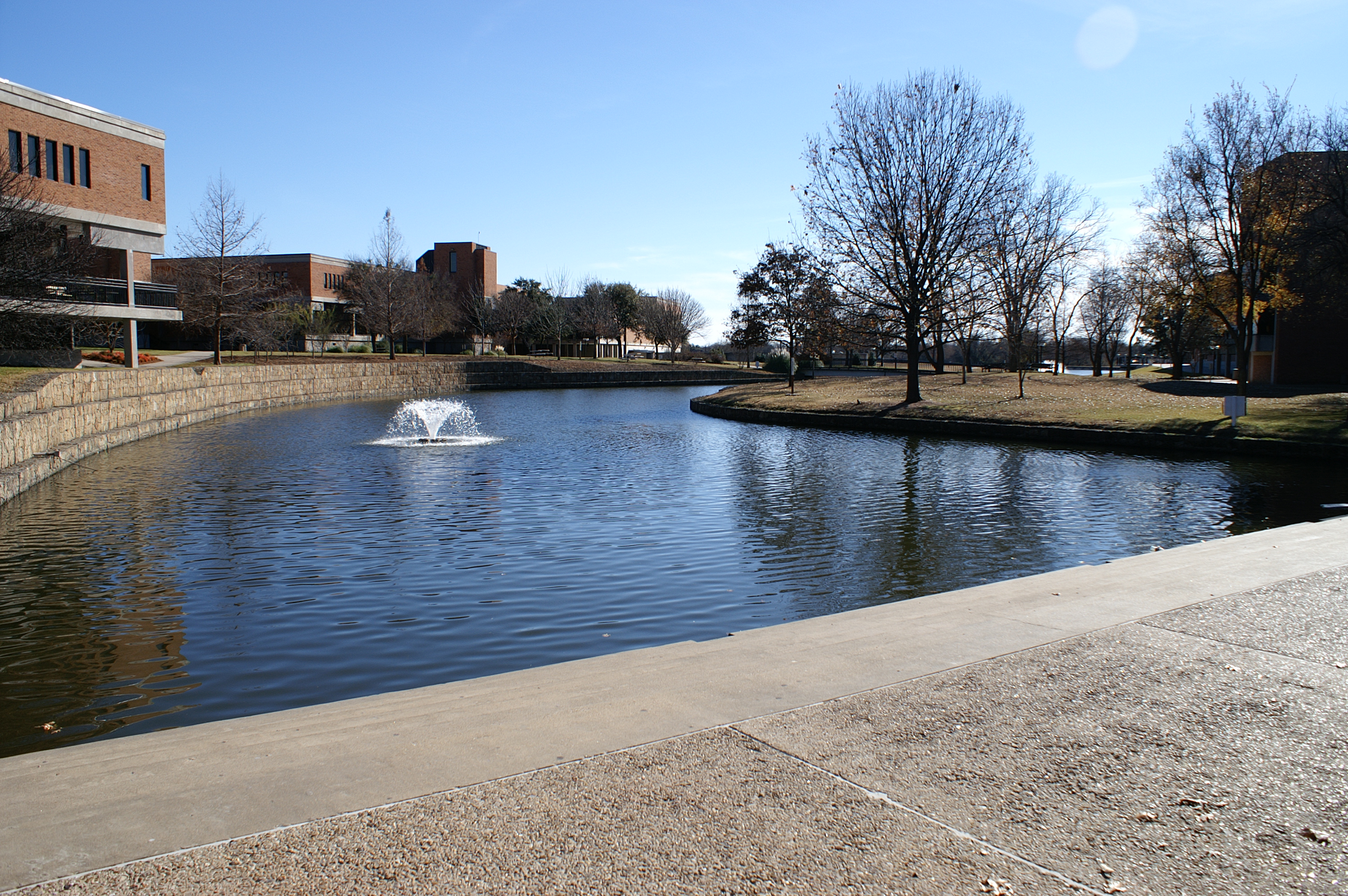 Brook beside the Richland campus student lounge, photographed in 2008. Richland campus in 75243. This 2008 photograph is historical, not a claim about current campus conditions.