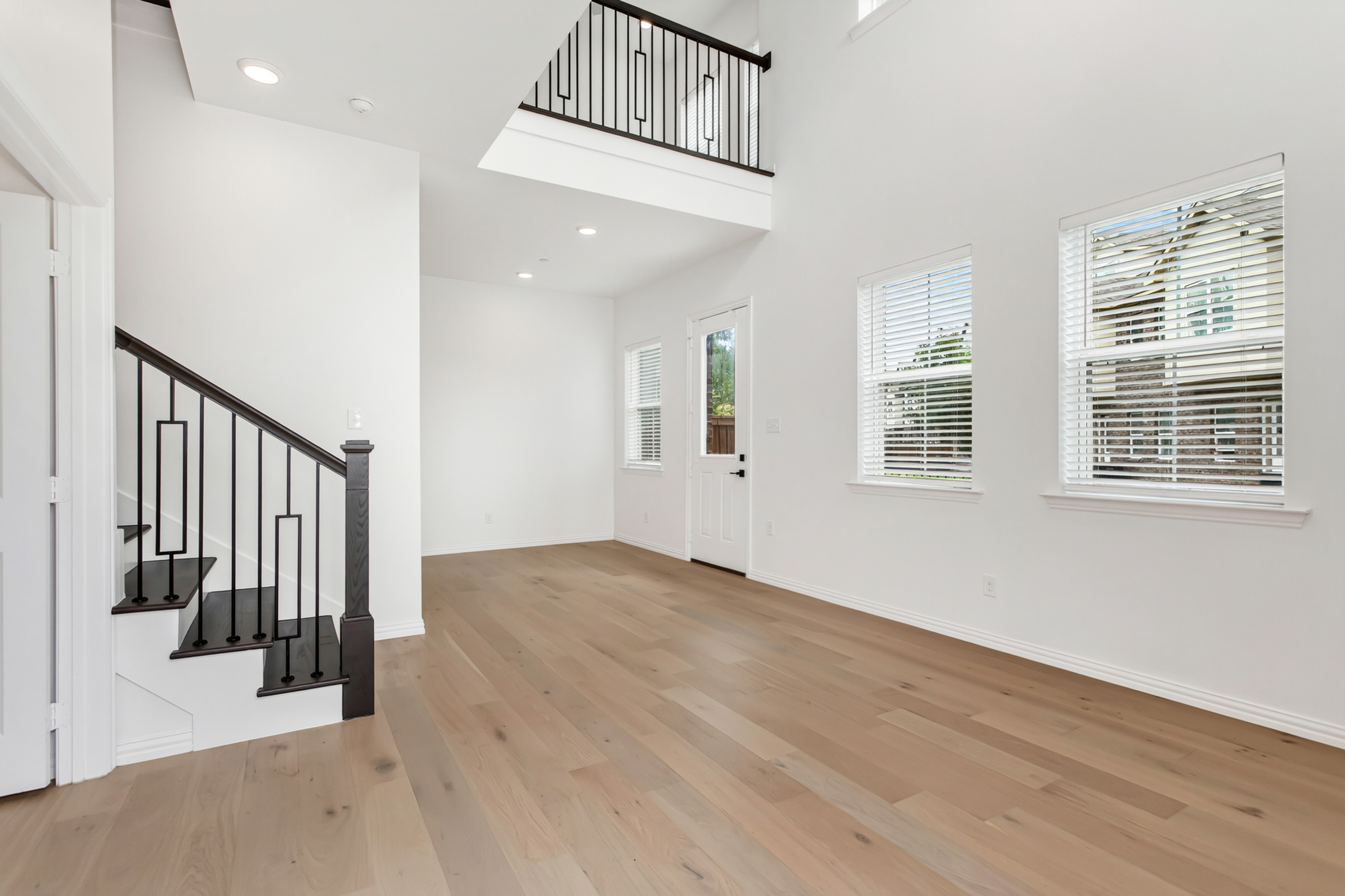 Living room with new staircase and railing
