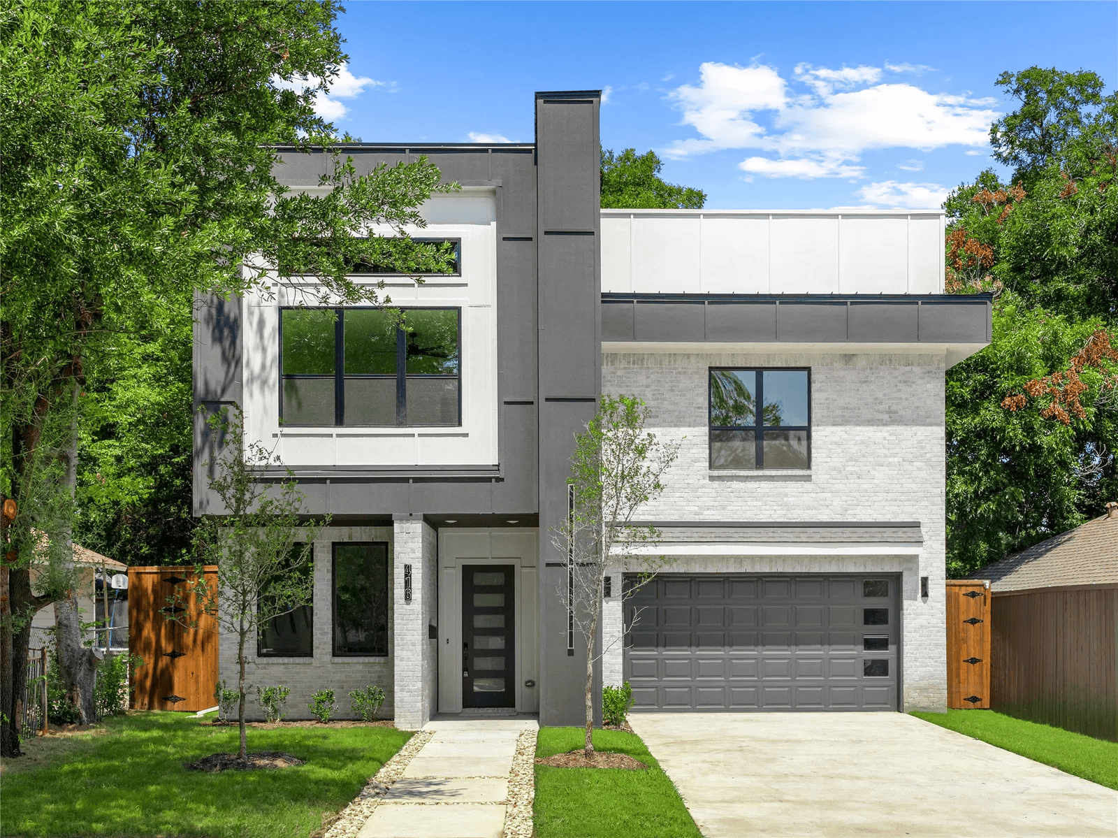 Contemporary stucco new construction exterior at 416 Mt Auburn Ave Dallas TX 75223