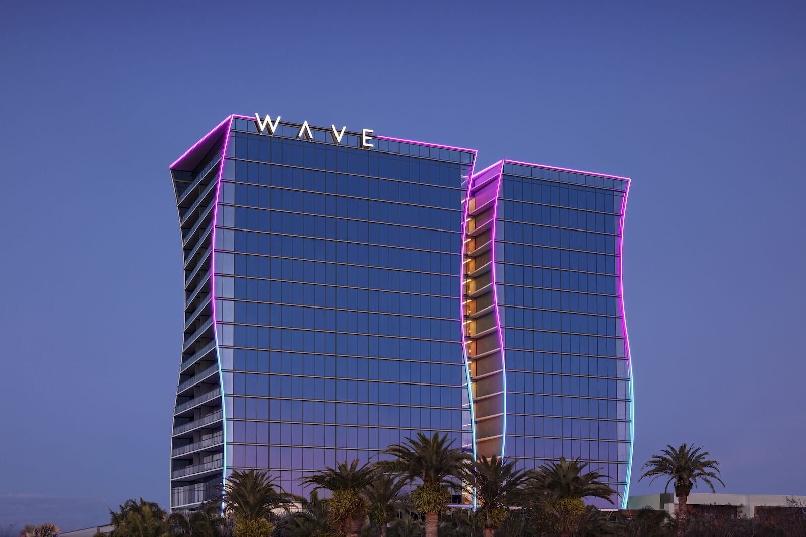 The curving towers of the Lake Nona Wave Hotel in Lake Nona Town Center