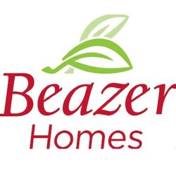 French Country style Beazer home with steeply pitched roof and stone facade in the Belle Vie neighborhood