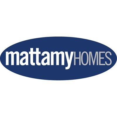 Mattamy Homes townhomes with front porches along a sidewalk in the Lake Nona area of Orlando