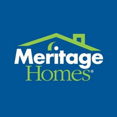 Large two-story Meritage home with tile roof and paver driveway in the Fell's Landing neighborhood