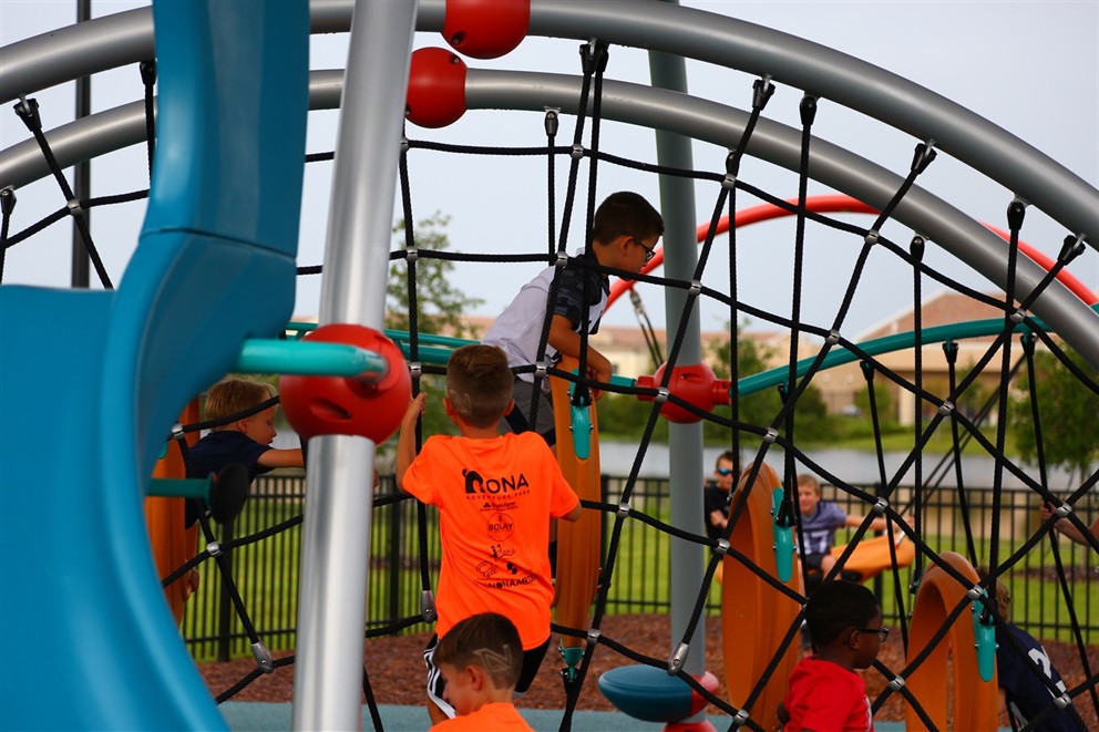 The playground and fields at Heroes Community Park in Lake Nona