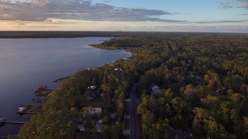 Oversized wooded homesite with mature trees on a no-HOA street in the Lake Nona area