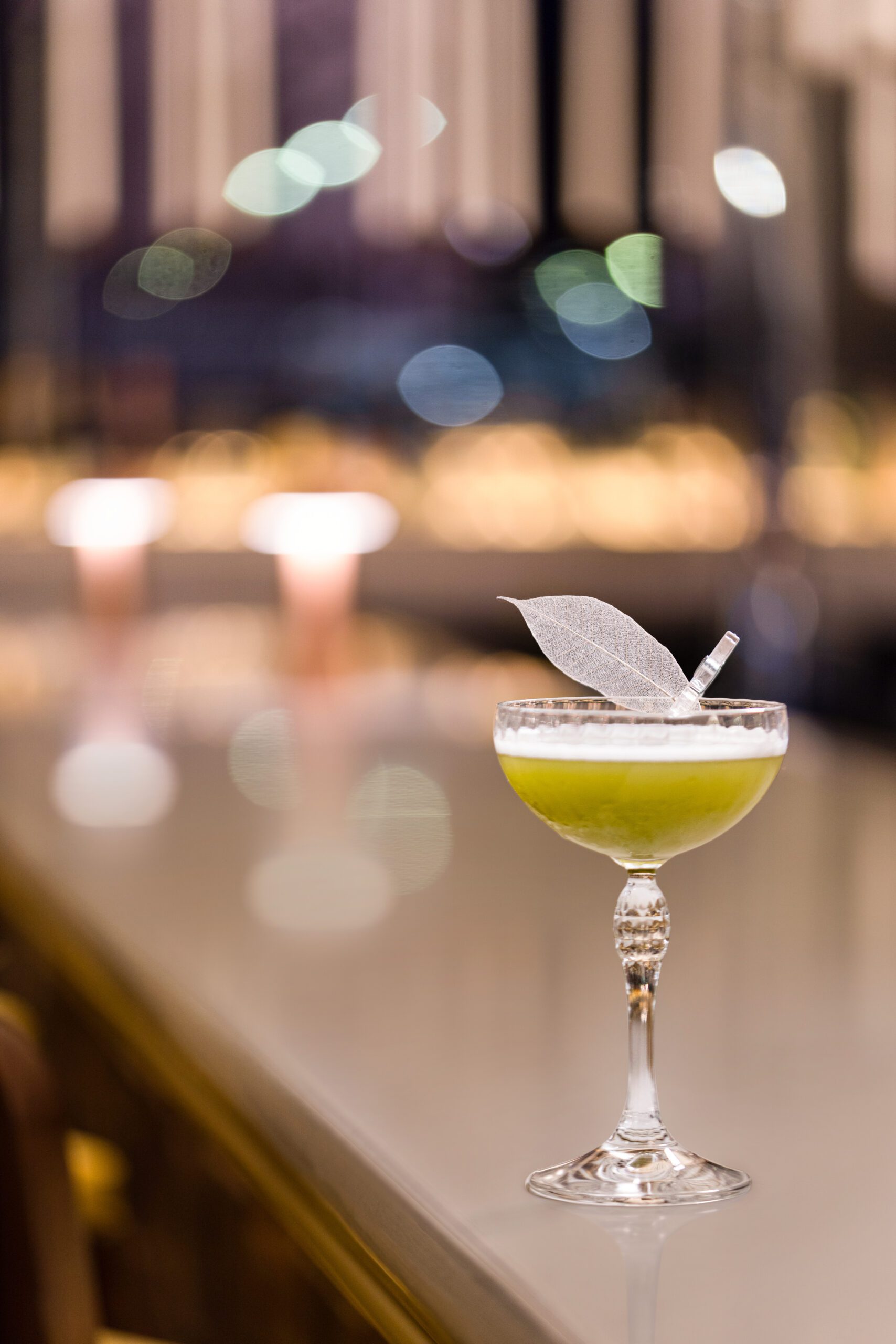 Bartender mixing a cocktail at the Mixology Mixer at the Lake Nona Wave Hotel