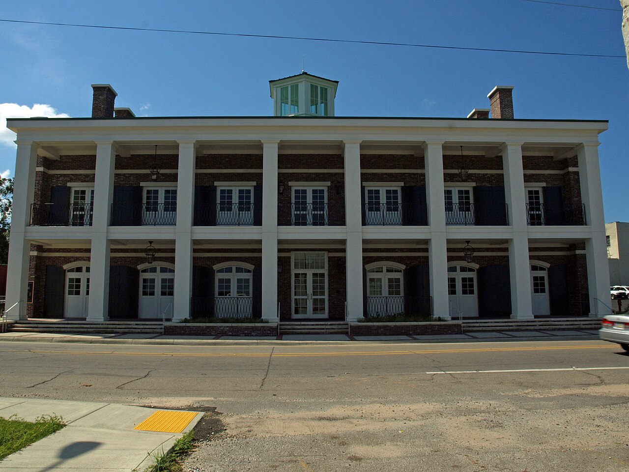 Moss Point City Hall, a two-story columned building downtown