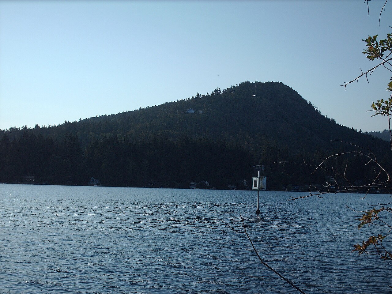 Shawnigan Lake with forested Mount Baldy rising above the water