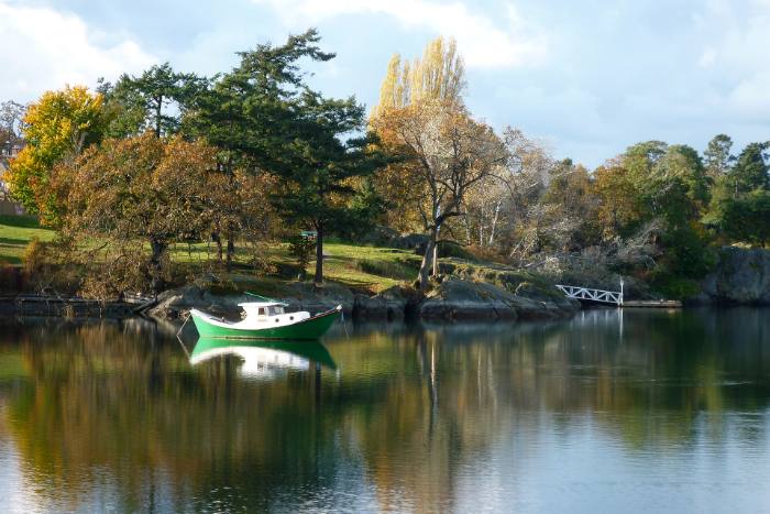 Small boat on the Gorge Waterway near Banfield Park in Vic West