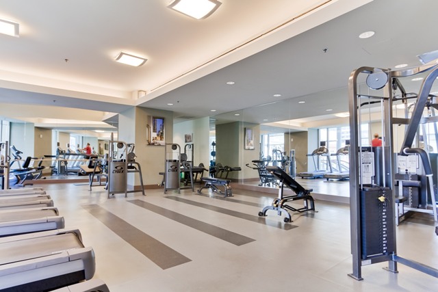 gym at the metropolitan condos on top of Omni hotel