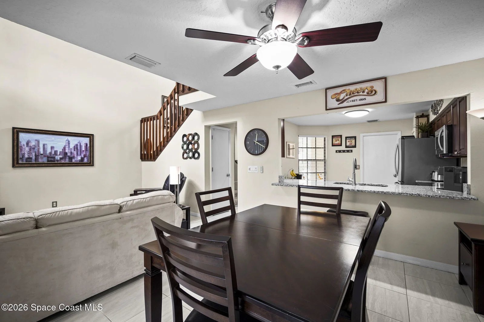Dining area under vaulted ceilings in a Weston Park townhome, Melbourne FL