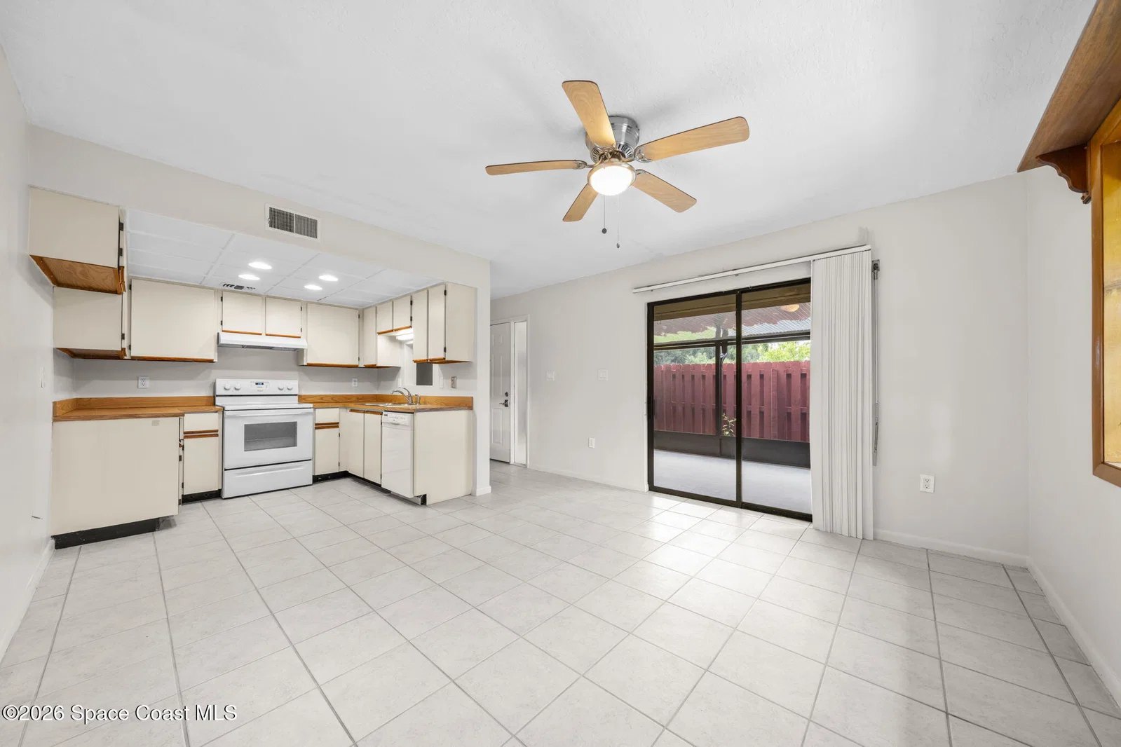 Open living area and kitchen at 44 Piney Branch Way, Melbourne FL