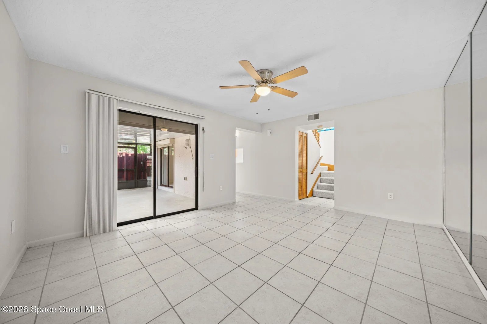 Living room with sliding doors at 44 Piney Branch Way