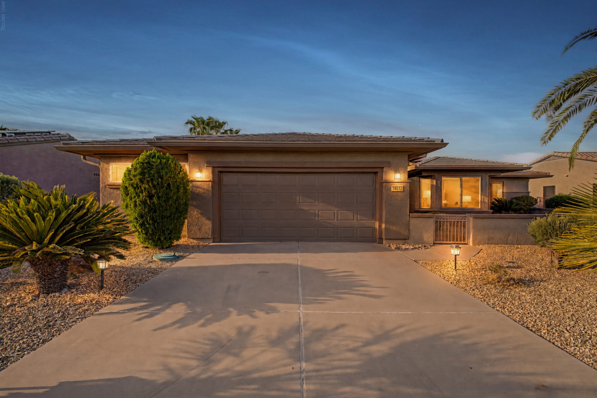 18012 W Tierra Del Sol Drive Surprise Sun City Grand single-story Borgata plan with a screened room and extended garage