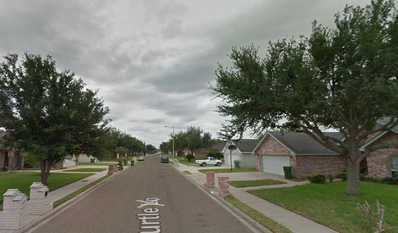 established neighborhood street in McAllen or Mission TX with mature trees