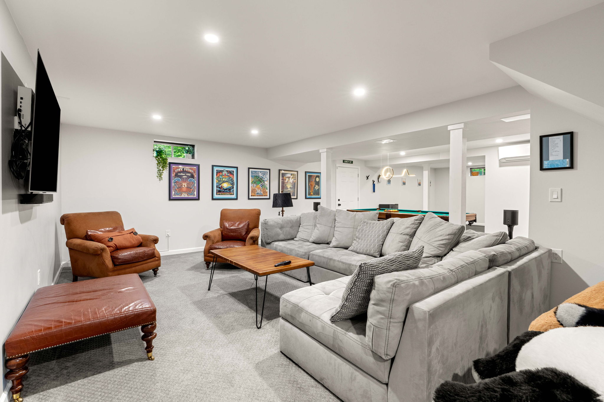 Finished lower level with gym area and living space at 10 Captain Circle Tewksbury