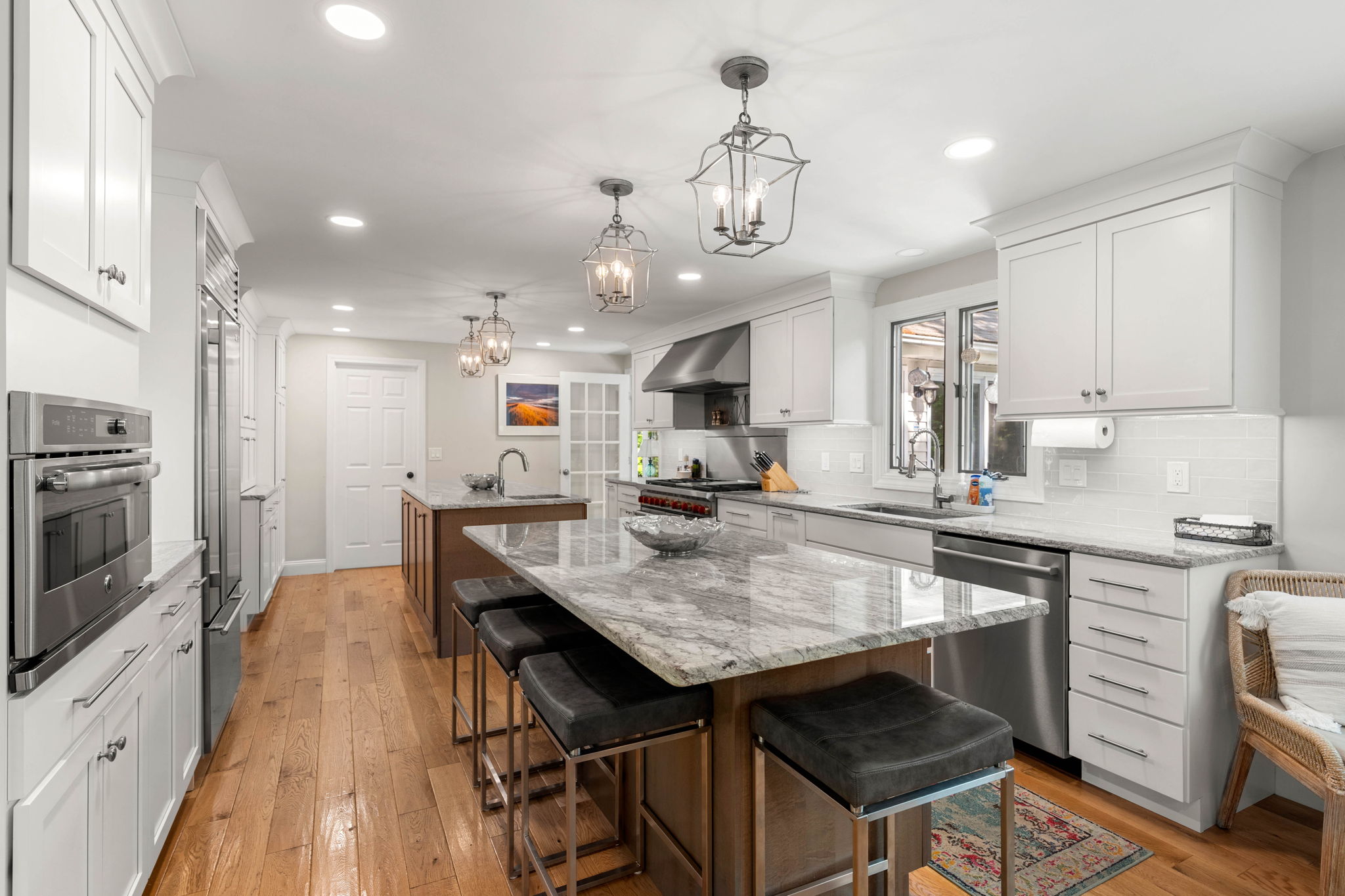 Renovated chefs kitchen with Wolf range and Sub-Zero refrigerator at 10 Captain Circle Tewksbury