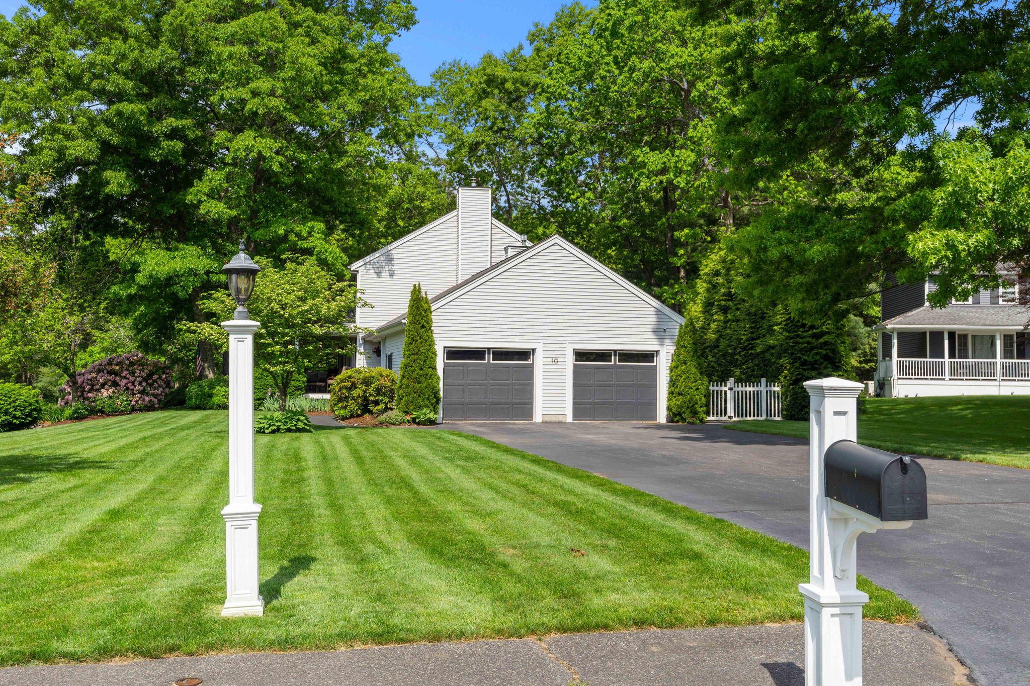 Two car garage with Tesla charger at 10 Captain Circle Tewksbury