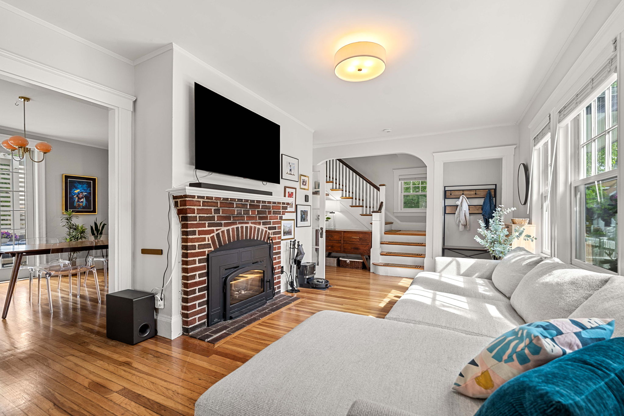 Living room with mantled fireplace and hardwood floors at 14 Curry Circle Swampscott