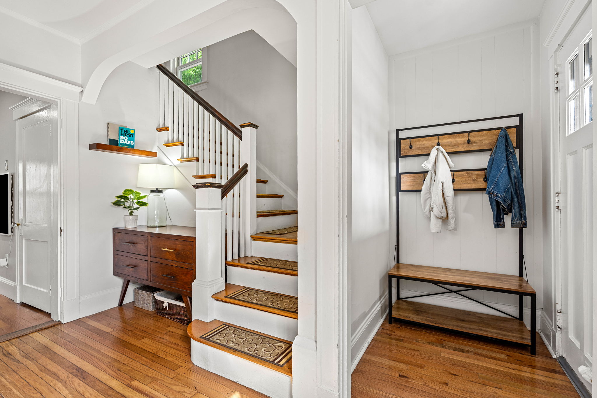 Foyer with original staircase and hardwood floors at 14 Curry Circle Swampscott