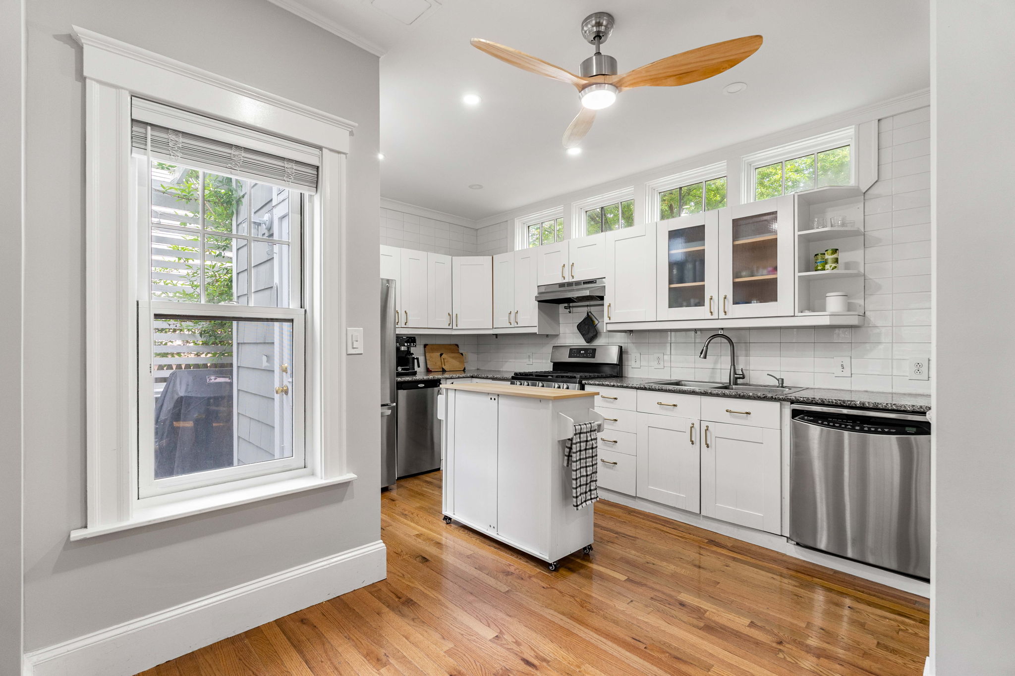 Updated kitchen with white cabinets and stainless steel appliances at 14 Curry Circle Swampscott