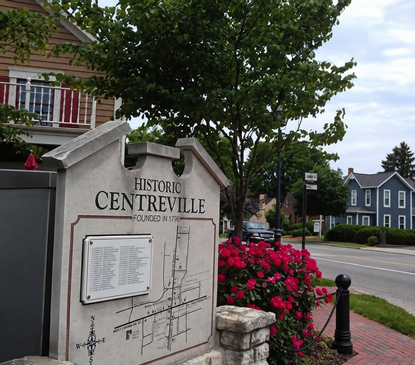 Historic Centerville sign, flowers and streetscape in Uptown Centerville, Ohio