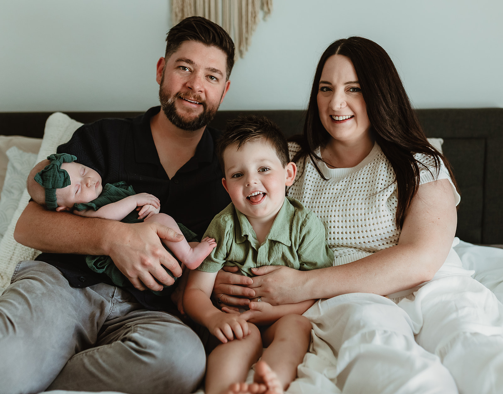 Family on bed