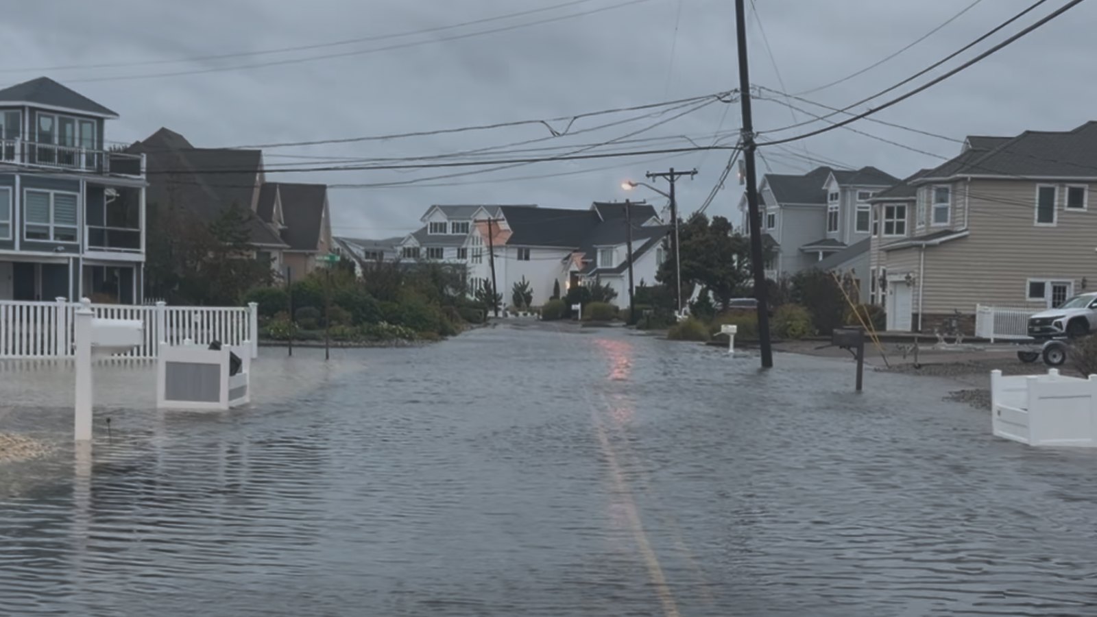 A bayside street in a low-lying Jersey Shore neighborhood covered in floodwater during the September 26, 2026 nor'easter